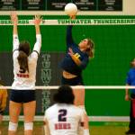 JOSH KIRSHENBAUM | THE CHRONICLE Aberdeen Annika Hollingsworth sends a ball over the net during a four-set loss to Black Hills in a loser-out match at the 2A District 4 Tournament on Saturday in Tumwater.