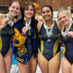 SUBMITTED PHOTO The Aberdeen 200-freestyle relay team of (from left) Mija Hood, Keara Burns, Harnoor Jandu and Ava Benn placed second at the 2A/1A District 4 Championships on Saturday in Shelton.