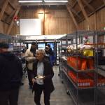 Clayton Franke / The Daily World
Members of the community check out the Salvation Armys new client-choice food bank on the corner of G and 2nd streets in Aberdeen at an opening ceremony on Monday, a day before the pantrys first day of service.