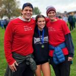 SUBMITTED PHOTO Hoquiam senior Jane Roloff, middle, celebrates winning the 1A State girls cross-country championship with father Casey, left, and mother Laura on Saturday at the Sun Willows Golf Course in Pasco.