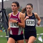 SUBMITTED PHOTO Hoquiams Jane Roloff (1243) leads Port Townsends Aaliyah Yearian during the 1A State Championship girls cross-country race on Saturday at the Sun Willows Golf Course in Pasco.