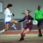 PHOTO BY FOREST WORGUM Montesano midfielder Bethanie Henderson (22) defends against Bellevue Christians Lucy Carrel in a 1A State Tournament first-round game on Wednesday in Montesano.