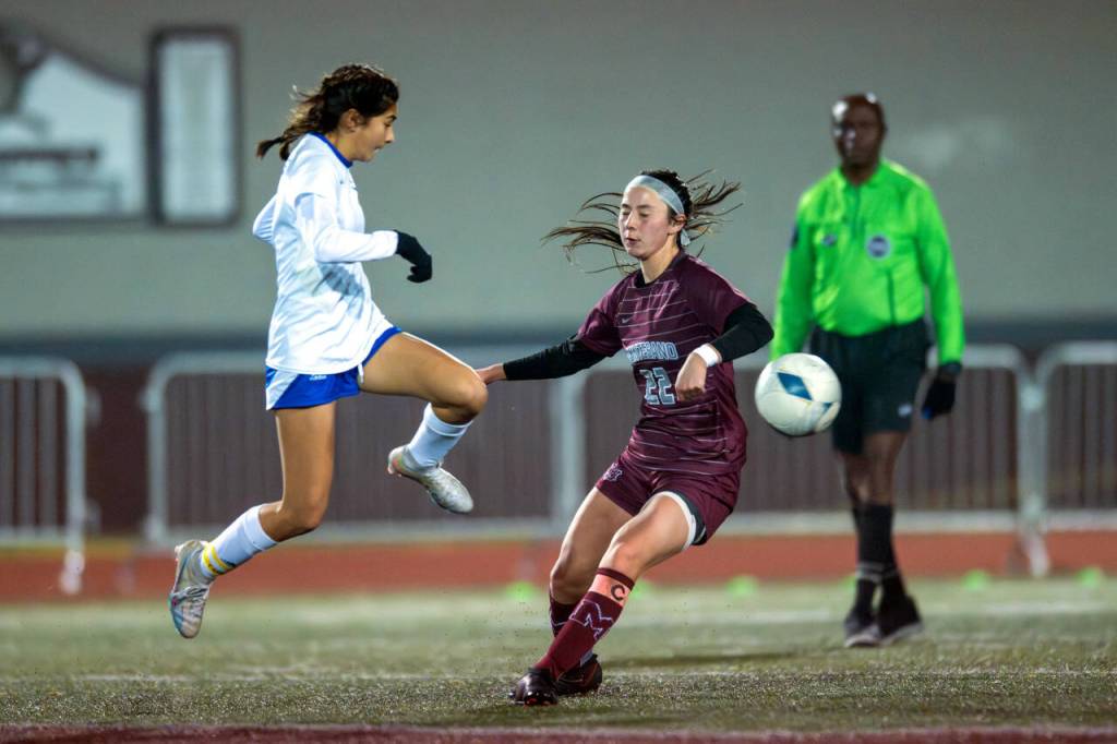 PHOTO BY FOREST WORGUM Montesano midfielder Bethanie Henderson (22) defends against Bellevue Christians Lucy Carrel in a 1A State Tournament first-round game on Wednesday in Montesano.