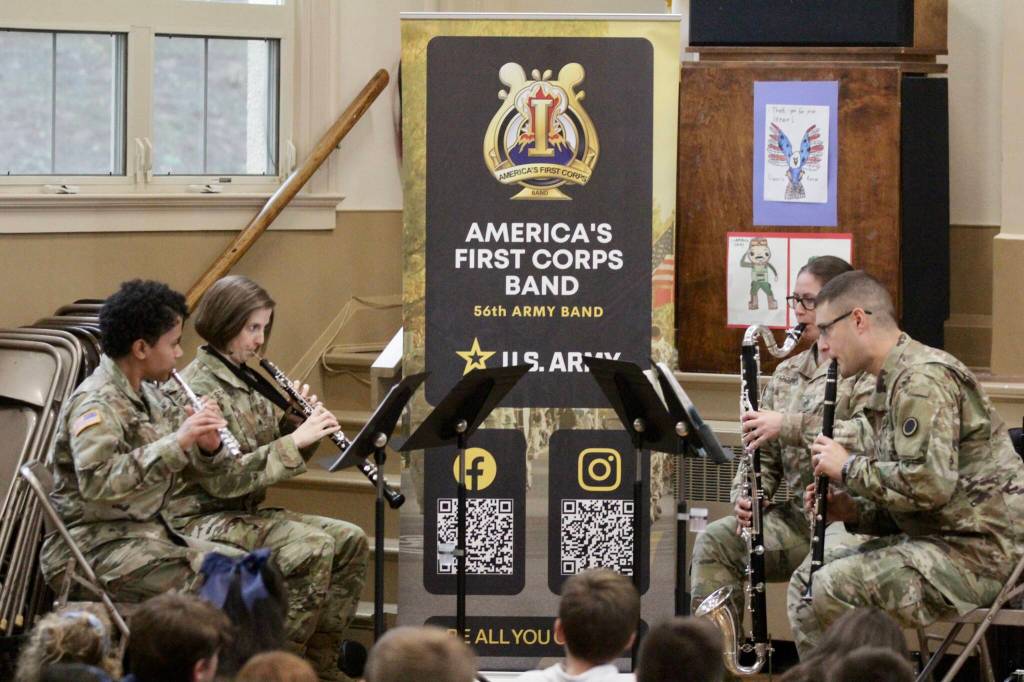 Michael S. Lockett / The Daily World
Army bandsmen play during a Veterans Day ceremony at St. Mary School on Nov. 9.