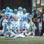 PHOTO BY FOREST WORGUM Montesano senior Bode Poler (22) finds running room during a 28-21 loss to Freeman in a 1A State first-round playoff game on Friday in Montesano.