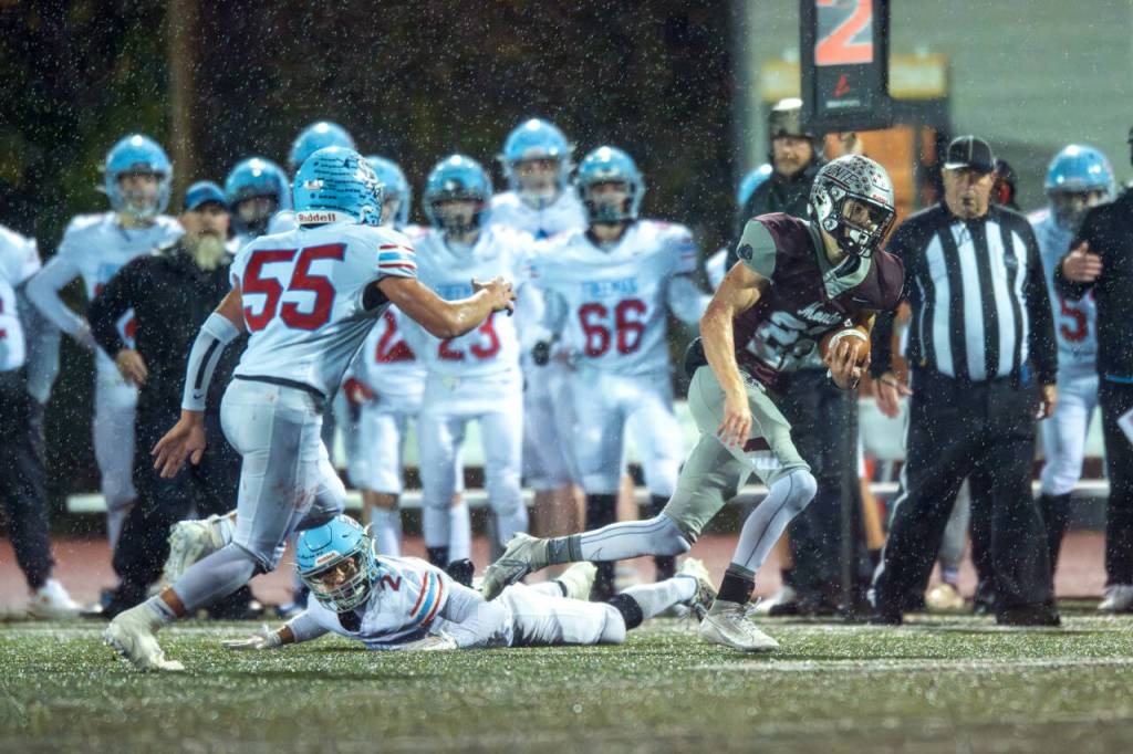PHOTO BY FOREST WORGUM Montesano senior Bode Poler (22) finds running room during a 28-21 loss to Freeman in a 1A State first-round playoff game on Friday in Montesano.