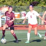 DAILY WORLD FILE PHOTO Montesano midfielder Bethanie Henderson (22) possesses the ball against Seattle Academy in a game on Sept. 9 in Montesano. The Bulldogs face the Cardinals in a 1A State semifinal game on Friday in Tacoma.
