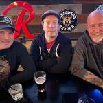 Matthew N. Wells / The Daily World
When This Way Out isnt wearing their character costumes, they look like regular guys  Ryan Baker, left, Aaron Vessey, center, and Larry Cowles. We consider ourselves when were not in tights and wigs as the spokespeople for the band, or even the roadies sometimes, Baker said while he explained a bit about what makes the band different and cool.