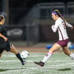 PHOTO BY FOREST WORGUM Montesano midfielder Bethanie Henderson, right, sends the ball forward during the Bulldogs 1-0 loss in the 1A State semifinals on Friday at Mount Tahoma Stadium in Tacoma.