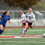 PHOTO BY FOREST WORGUM Montesano senior forward/midfielder Mikayla Stanfield (10) chases the ball down against La Center senior Shaela Bradley during the Bulldogs 3-1 win in the 1A State third-place game on Saturday at Mount Tahoma Stadium in Tacoma.