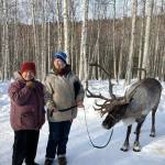 Provided photo
Dawn Keogh, center, stands with her friend Connie, left, and a reindeer at a Running Reindeer Ranch in Fairbanks, Alaska, in between her two cancer journeys. Keogh fought colon cancer during 2018 and 2019. Then in 2023, she was diagnosed with peritoneal cancer. On Sunday, Hoquiam Brewing Company and Mark Bowman will host a fundraiser for Keogh.
