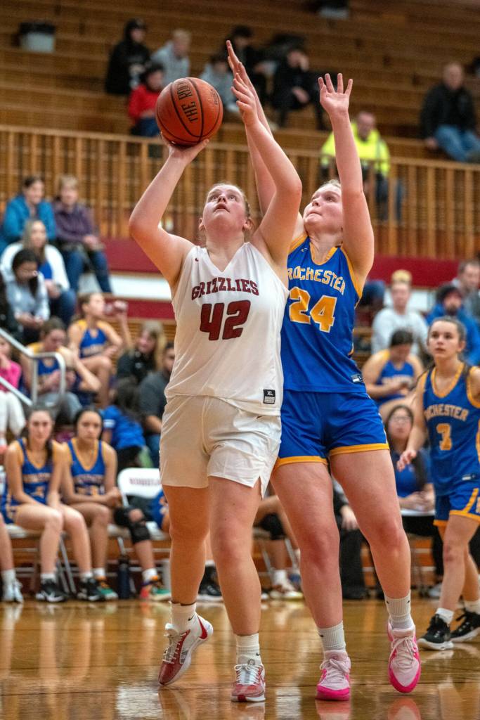 PHOTO BY FOREST WORGUM Hoquiams Sydney Gordon (42) puts up a shot against Rochesters Delany Winter during a 45-18 season-opening loss on Tuesday at Hoquiam High School.