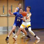 RYAN SPARKS | THE DAILY WORLD 
Aberdeen senior Baylor Ainsworth (5) is defended by Elmas Carter Studer (24) during a 59-30 loss on Wednesday at Aberdeen High School.