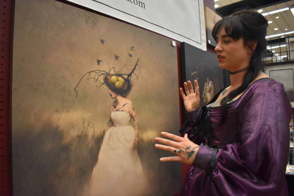 Matthew N. Wells / The Daily World
Jade Black, a self-portrait photographer, explains what goes into her art. This photo shows Black wearing part of a tree and a nest at Damon Point. I got this branch and I put it on my head, Black said. And then in Photoshop I went ahead and took the nest that I photographed and I put it on my head as well to make it look like Im sort of a tree with a nest on my head. Search online for www.jade-black.com to find more of Blacks work.