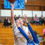 PHOTO BY FOREST WORGUM Montesano sophomore Jillie Dalan, left, scores two of her game-high 29 points while defended by La Centers Riley Schultz during the Bulldogs 72-22 win on Thursday in Montesano.