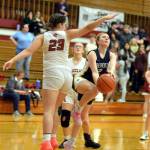 RYAN SPARKS | THE DAILY WORLD Aberdeen senior guard Annie Troeh (2) performs a Euro-step layup against Hoquiams Avery Howard in the first quarter of the Bobcats 53-32 victory on Friday in Hoquiam.