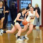 RYAN SPARKS | THE DAILY WORLD Aberdeen freshman guard Bentley Btrown, left, dribbles against Hoquiams Dylan Little during the Bobcats 53-32 victory on Friday in Hoquiam.