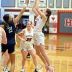 RYAN SPARKS | THE DAILY WORLD Hoquiam junior guard Katlyn Brodhead, right, hits a jump shot against Aberdeen senior Jaylynn Phimmasone (21) during a 53-32 loss on Friday in Hoquiam.