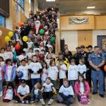 Michael S. Lockett / The Daily World
Police and children pose for a photo during the Shop with a Cop event on Saturday morning at Aberdeen High School.