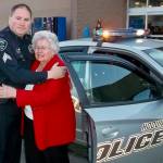 Courtesy photo / Cosmopolis Police Department
Sgt. Shane Krohn, who eventually ended up running the program, hugs Betty Crass, a civilian employee of the sheriffs office who started the Shop with a Cop program 25 years ago.