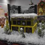 Matthew N. Wells / The Daily World
One of the standout business gingerbread houses was Side One Studios candy replica building, done by Dani Bacon, co-owner of the actual building. People stopped and stared at it in order to see all the little details, such as The Green Room, on the southwest corner of the building, the Moyer Multimedia logo that is in one of the windows, as well as the urban moss green paint that the much larger building at South K and West Wishkah streets is known for having.