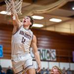 PHOTO BY FOREST WORGUM Montesano senior foward Gabe Bodwell (12) dunks for two of his 10 points in a 69-43 victory over Centralia on Tuesday in Montesano.