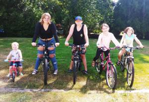 Provided photo
From left Jakob DeAlexandro, Chelcee DeAlexandro, Masen Ayres, Ella DeAlexandro and Brooklyn Ayres show off bikes they received from Bicycles from Heaven, a collaboration between the Aberdeen Lions Club, Stafford Creek Corrections Center and the Salvation Army.
