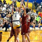 RYAN SPARKS | THE DAILY WORLD Aberdeen senior forward Baylor Ainsworth (5) drives to the rim during a 55-49 overtime win against Hoquiam on Monday in Aberdeen.