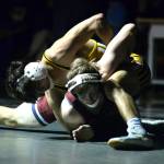 RYAN SPARKS | THE DAILY WORLD Aberdeens Aidan Watkins, top, controls Hoquiams Brandon Daniel during a dual meet on Tuesday in Hoquiam.