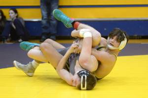 RYAN SPARKS / THE DAILY WORLD Aberdeens Aidan Watkins, right, controls the legs of Willapa Harbors Connor Reyes during a 157-pound match at the Grays Harbor Championship meet on Saturday at Aberdeen High School.
