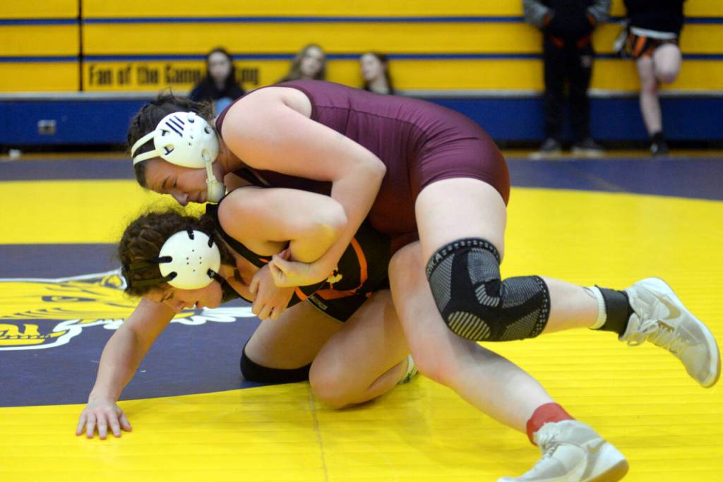 RYAN SPARKS | THE DAILY WORLD 
Montesanos Kay Roundtree, top, works for a pin against Napavines Maya Kunkel in the 170-pound final of the Grays Harbor Championship meet on Saturday at Aberdeen High School.
