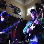 Clayton Franke / The Daily World
Matthew Wells, right, a reporter with The Daily World, joins Justin Kautzman and rock bank Black Shepard for a rendition of Bob Segars Old Time Rock and Roll on Friday, Dec. 15 at Messy Jessys Bar and Grill in downtown Aberdeen.