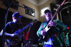 Clayton Franke / The Daily World
Matthew Wells, right, a reporter with The Daily World, joins Justin Kautzman and rock bank Black Shepard for a rendition of Bob Segars Old Time Rock and Roll on Friday, Dec. 15 at Messy Jessys Bar and Grill in downtown Aberdeen.