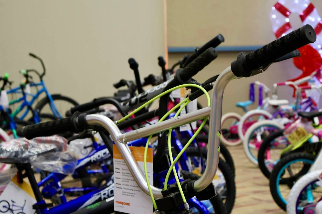Dozens of bikes were handed out during the Don and Pat Scotts Christmas for Kids event in Ocean Shores on Saturday. (Michael S. Lockett / The Daily World)