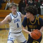 RYAN SPARKS | THE DAILY WORLD Aberdeens Isaac McGaffey (1) defends Aberdeens Manny Garcia during the Eagles 64-51 win on Tuesday at Elma High School.
