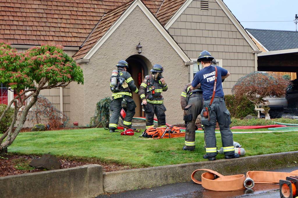 Aberdeen and Hoquiam firefighters responded to a house fire Thursday morning in North Aberdeen. (Michael S. Lockett / The Daily World)