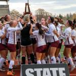 DAILY WORLD FILE PHOTO 
The Montesano Bulldogs hoist their state third-place trophy after defeating La Center in November.