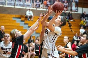 PHOTO BY FOREST WORGUM Montesanos Jillie Dalan, right, puts up a shot during a 51-11 win over Tenino on Wednesday at Montesano High School.