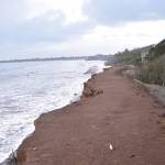 Clayton Franke / The Daily World
Recent wave action removed about half of the 30-foot-wide, 300-foot-long sand berm in Ocean Shores constructed in December to buffer waves from reaching public infrastructure, leaving a 20-foot sand cliff on Jan. 10.