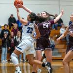PHOTO BY FOREST WORGUM Montesanos Jillie Dalan (24) attempts to block the shot of Elmas Eliza Sibbett during the Bulldogs 53-32 win on Wednesday at Elma High School.