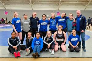 SUBMITTED PHOTO Grays Harbor College womens wrestling team placed fourth overall at the Mat Cat Invitational on Sunday in McMinnville, Oregon. Pictured are (front row, from left): Maysa Brown, Hailee Stoken, assistant coach Morgan Shines, Courtney Jones, Declyn Foster, Gloria Hudson. Back row: Elizabeth Patana, Marissa Riojas, Alexandria Kauffman-Templeton, Nancy Frayle, Aliya Hammons, Renaeh Ureste, Cassidy Rehder, head coach Kevin Pine.
