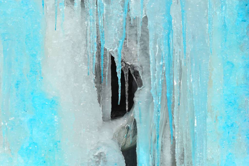 Matthew N. Wells / The Daily World
This isnt a cave. This is a close-up view of the fountain in front of Aberdeen City Hall. The artistic piece is called Heaven, Man and Earth, and its by George Tsutakawa. The piece is dated 1997. However the icicles and what appears to be blue dye are new. They popped up sometime in the last couple days.