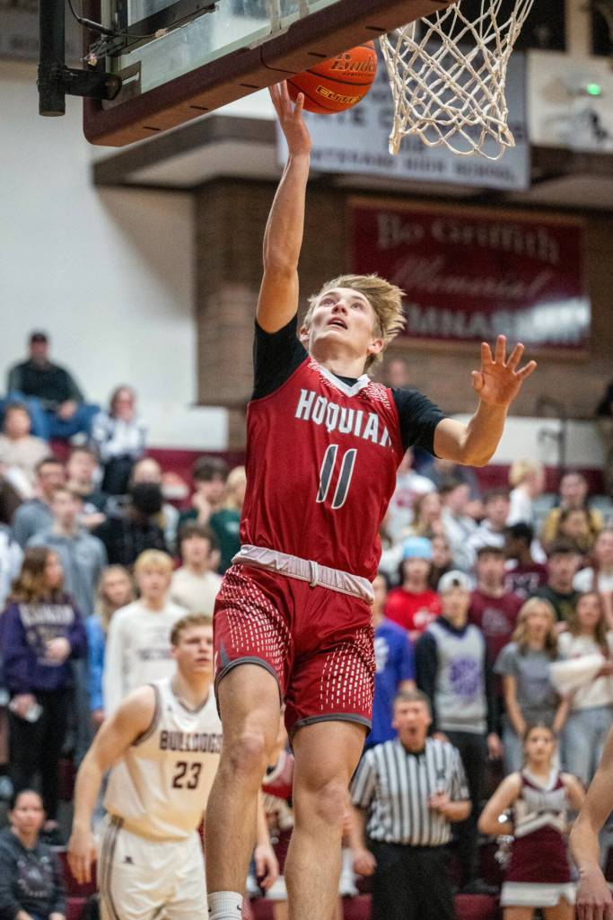 PHOTO BY FOREST WORGUM
Hoquiam senior Zander Jump (11) scores two of his 14 points in a 65-61 overtime win against Montesano on Tuesday in Montesano.