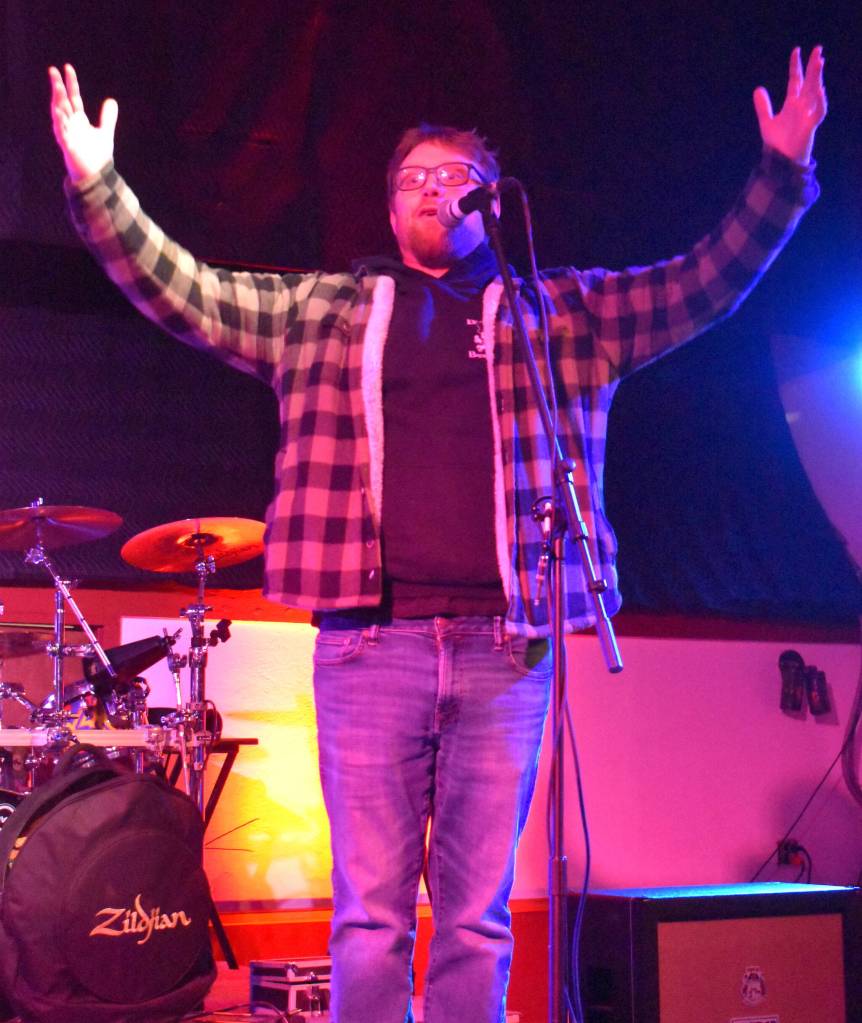 Justin Kautzman, who helps run The Loading Dock, introduced and hyped up each of the four musicians who played solo acts Monday evening. In addition to hosting Aberdeen musicians Ty Wulf and Hollow Hound, Kautzman was happy to welcome international artists, Englishman Tim Holehouse and Greg Rekus, of Winnipeg, Canada. While he had great things to say about all the artists, his comment on Rekus' performance stood out. "The energy that Greg brings to the stage as a single person is more than I've seen bands bring," Kautzman said. (Matthew N. Wells / The Dailiy World)