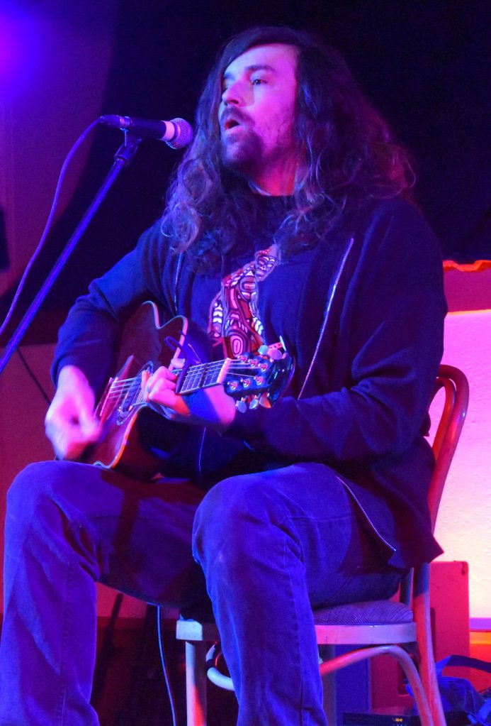 Ty Wulf, the second act of four on Monday night at The Loading Dock, played a set that was quite popular. Wulf has a unique voice and is a strong songwriter. He even played a brand new song he released Sunday night, called Resisting A Rest on his YouTube channel, Ty Wulf Music. He even acquired some new, international industry fans in Greg Rekus, from Winnipeg, Canada, and Tim Holehouse, from England. (Matthew N. Wells / The Daily World)