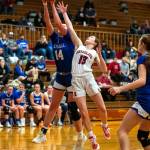 PHOTO BY FOREST WORGUM Hoquiams Katlyn Brodhead (13) and Eatonvilles Lillian Bickford compete for a rebound during the Grizzlies 60-16 loss on Saturday at Hoquiam Square Garden.