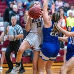 PHOTO BY FOREST WORGUM Montesanos Lex Stanfield (10) goes up for a shot against Eatonvilles Ryan Stammen (22) during the Bulldogs 58-39 win on Tuesday at Montesano High School.