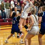 PHOTO BY FOREST WORGUM Montesano sophomore Jillie Dalan shoots over Elma senior Malia Sibbett (21) during the Bulldogs 56-34 win on Thursday at Montesano High School.
