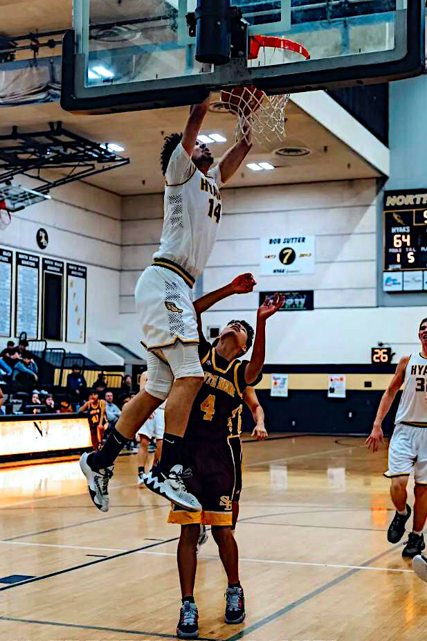 PHOTO BY MATT THE PHOTOGRAPHER North Beachs Tyrell Hovland (14) dunks in a win over South Bend on Thursday in Ocean Shores.