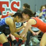 RYAN SPARKS | THE DAILY WORLD Grays Harbor Colleges Maysa Brown, left, jostles with Utah Techs Kailani Bicoy during a 130-pound match at the NCWA Womens National Freestyle Invitational on Sunday in Hoquiam.